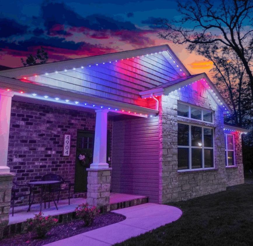Modern Alberta home with RGBW permanent LED Christmas lights controlled by smartphone app