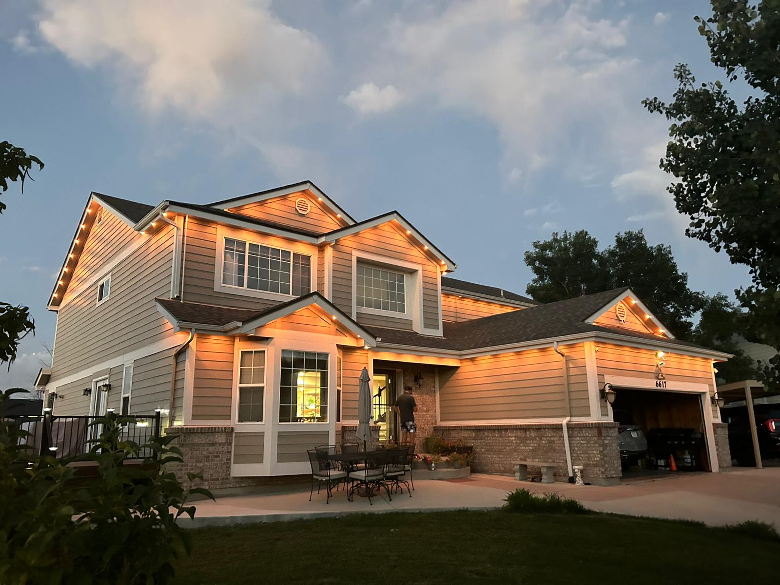 Edmonton residential property with weatherproof permanent LED soffit lighting at night